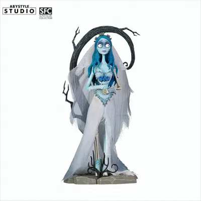 A figurine of Emily from Corpse Bride standing on a base with a tree-like structure behind her.