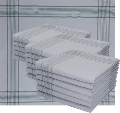 A stack of folded white handkerchiefs with green stripes, placed on a larger white cloth with green stripes.