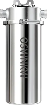 A silver water softener system with text etched on its side.
