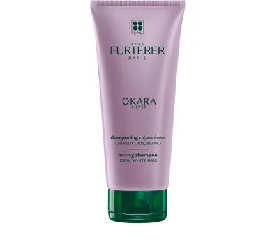 A product shot of a Rene Furterer Okara Silver Toning Shampoo bottle against a white background.
