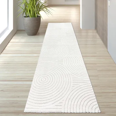 Produktbild von Eleganter Wohnzimmerteppich mit geometrischem Kreismuster in Creme Größe - 80 x 150 cm