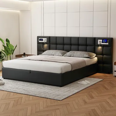 A black upholstered bed with integrated bedside lamps and charging stations is shown in a bedroom setting.