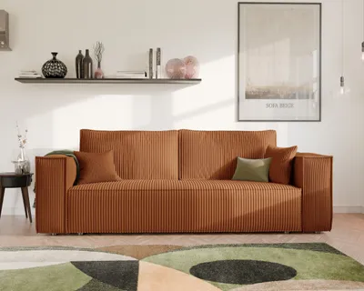 A modern living room with a sofa, shelf, and artwork.