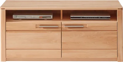 A front view of a wooden media console with two open shelves at the top and two drawers below.