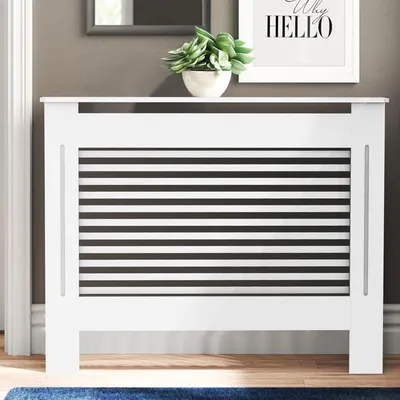 Immagine prodotto di FATIVO Copriradiatore 111×19×101 cm: Copertura per radiatore extra alta in bianco con finitura effetto legno, in MDF ispessito, lamelle orizzontali