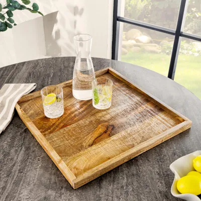 Produktbild von riess-ambiente Massives Tablett MAKASSAR 50cm Mangoholz Servierbrett Serviertablett Sofatablett