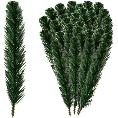 A collection of artificial pine branches arranged in a fan shape, with one branch shown individually to the left.