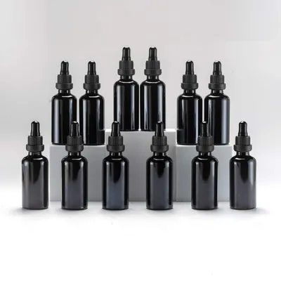 Obrázok produktu pre 50 ml čierna sklenená fľaša s pipetou – 12 kusov, vhodné na esenciálne oleje