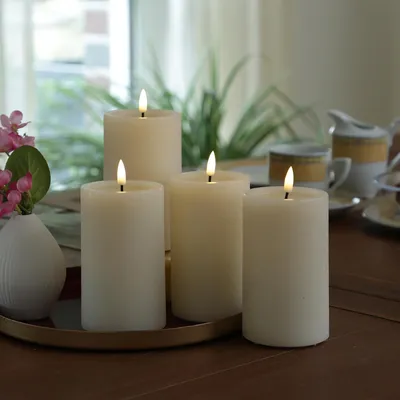 Produktbild von LED Kerzenset UNIQUE - Rustik-Optik - H: 12,5cm - mit Batterien und Fernbedienung - creme - 4er Set