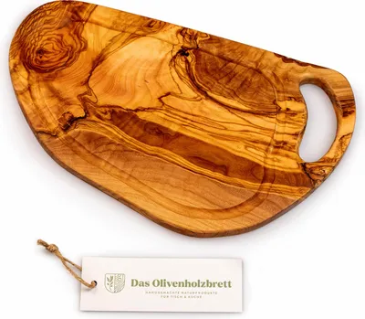 A wooden cutting board with a handle and a juice groove, shown on a white background with a product tag.