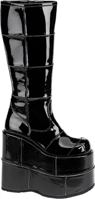 A single black patent leather platform boot shown from the side.