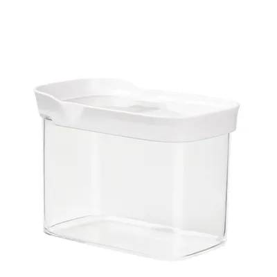 A clear, studio shot of a transparent food storage container with a white lid, isolated on a white background.