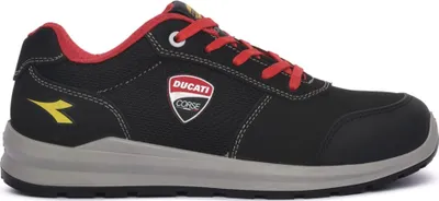 A side view of a black Diadora Utility Speedy Race shoe with red laces and accents, and a Ducati Corse logo on the side.