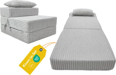 A folded mattress and a unfolded mattress with a pillow, shown on a white background.