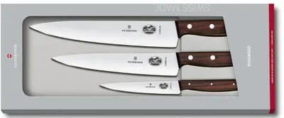 A set of three kitchen knives with wooden handles, presented in a grey box.