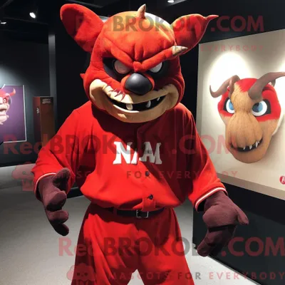 Immagine prodotto di Personaggio in costume mascotte REDBROKOLY del diavolo vestito con una maglietta da baseball e delle fasce