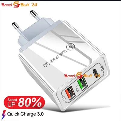 A white USB charger with multiple ports.