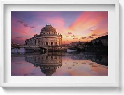 Produktbild von Blick auf die Stadt am Abend– Wandbild mit Rahmen – Gerahmtes Bild  – Wanddekoration – 70x50 cm –  Schwarz Rahmen