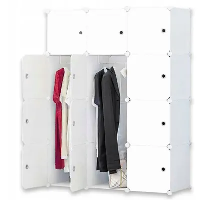 A white modular wardrobe with clothes hanging inside.