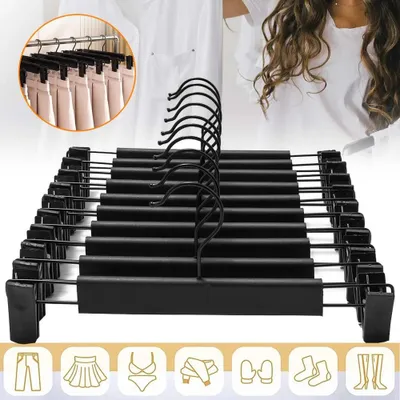 Immagine prodotto di Set di 10 grucce per pantaloni con mollette - Grucce per abiti - Colore nero - Antiscivolo - Mollette regolabili - Salvaspazio - Adatte per pantaloni, gonne e jeans