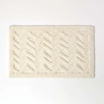 Produktbild von HOMESCAPES Rutschfeste Hochflor-Badematte mit Chevron-Muster, weiß