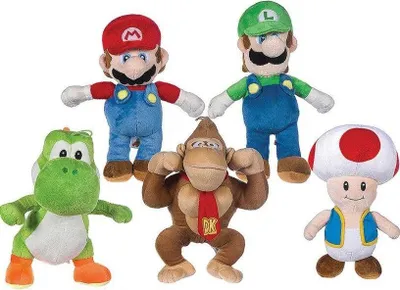 A collection of five plush toys from the Super Mario Bros. franchise.