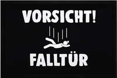 Produktbild von Fußmatte mit Spruch Vorsicht! Falltür lustiger Türvorleger rutschfest & waschbar Moonworks® schwarz 60x40cm