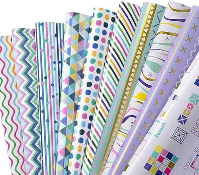 Productafbeelding van Famanu cadeaupapier set met 7 vellen en 2 rollen lint - Lila strepen