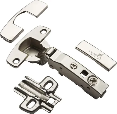 A set of cabinet hinges and mounting plates are displayed on a white background.