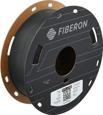 A spool of black 3D printer filament is shown against a white background.