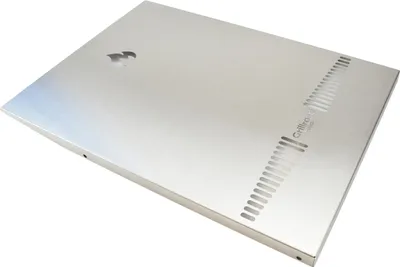 A silver-colored metal panel with ventilation slits and a logo.
