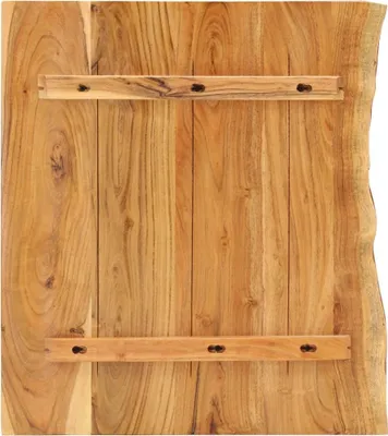 The back of a wooden countertop with two horizontal wooden planks attached with screws.