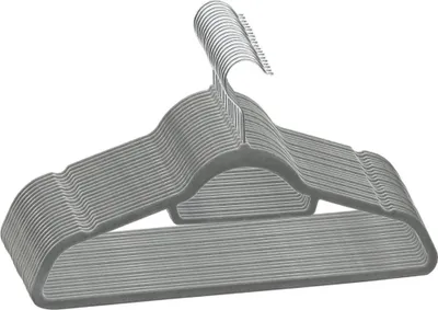 A stack of gray velvet hangers with metal hooks, isolated on a white background.