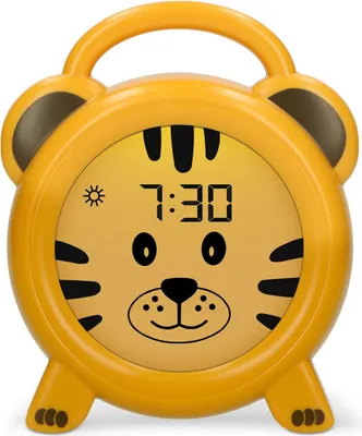 A yellow tiger-shaped alarm clock with a digital display showing the time.