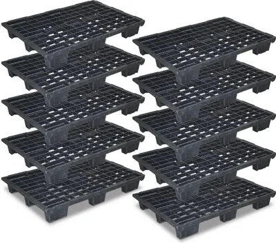 A stack of black plastic pallets.
