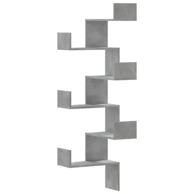 A gray, zig-zag shaped wall shelf unit against a white background.