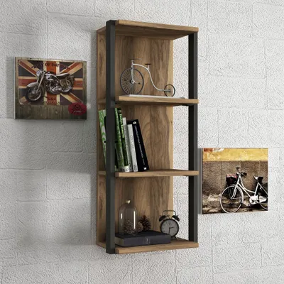 A wall-mounted bookshelf with decorative items and books.