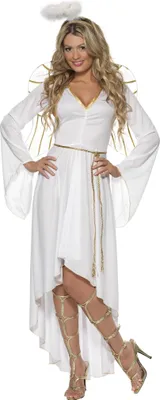 A woman is posing in an angel costume.