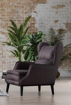 Zdjęcie produktu dla Elegancki ciemnofioletowy fotel z podnóżkiem dla stylowej atmosfery w salonie