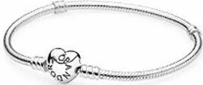 A silver Pandora bracelet with a heart-shaped clasp is shown against a white background.