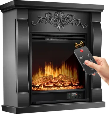 A hand holding a remote control is shown operating an electric fireplace.