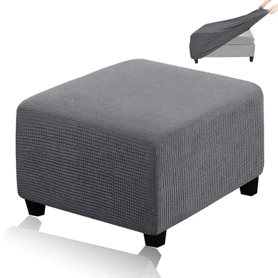 A gray ottoman slipcover is shown on an ottoman. There is a small inset image showing how to put the slipcover on.