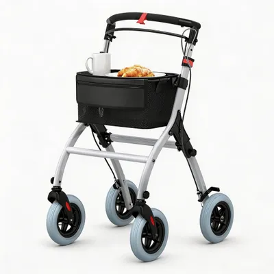 Produktbild von Schmaler Indoor Rollator - Wohnungsrollator - Faltbar - Extra leicht 7,8 kg - Leise rutschfeste Räder - Ablagetablett für Senioren - Elfenbein