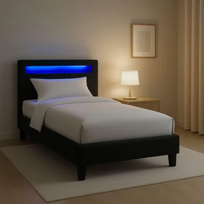 A bedroom scene with a bed, nightstand, and lamp.