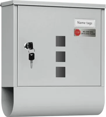 A gray metal mailbox with a newspaper holder and keys in the lock.
