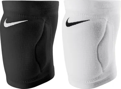 A pair of Nike volleyball knee pads, one black and one white, are shown side-by-side against a white background.
