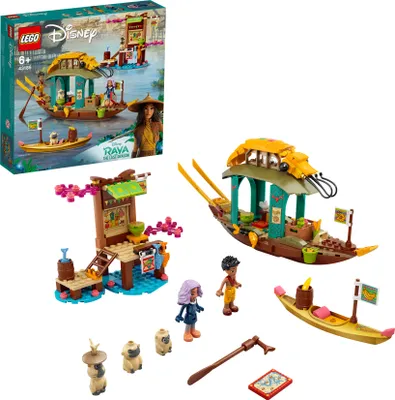 A LEGO set featuring a boat and market stall from Raya and the Last Dragon, with minifigures and accessories.