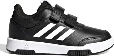A black Adidas sneaker with white stripes and a white sole, shown from the side.