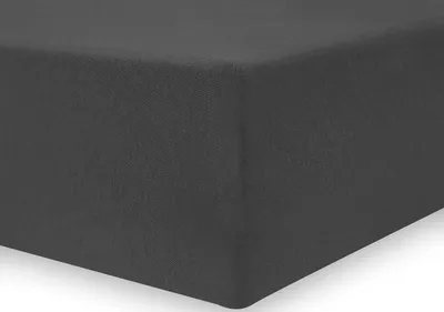 A close-up, angled view of a dark gray fitted sheet.