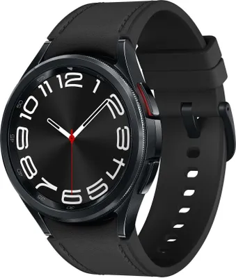 A close-up view of a black Samsung Galaxy Watch6 Classic smartwatch with a black leather strap, set against a white background.
